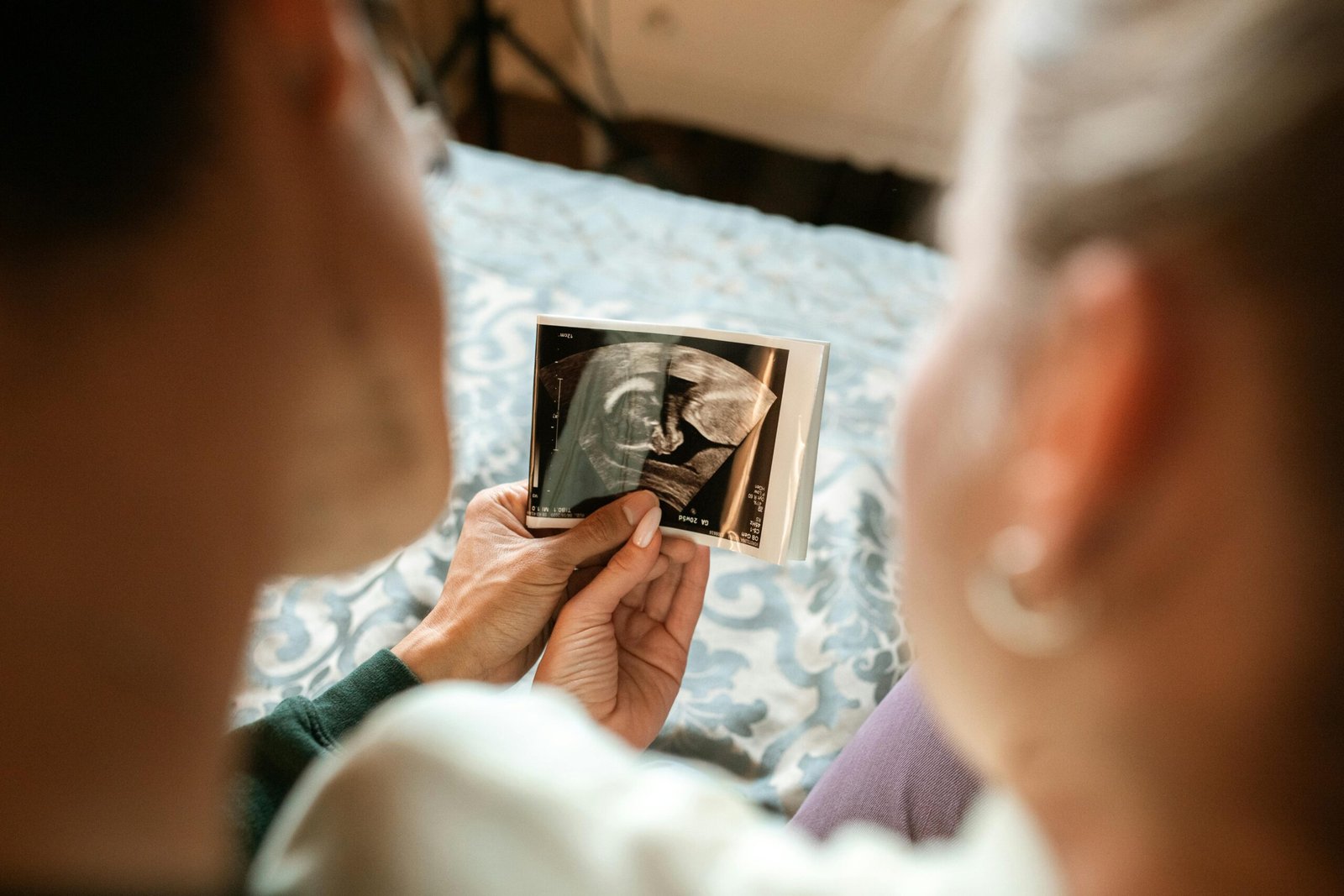 Queer couple with sonogram